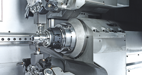 Spindel und Werkzeugrevolver in dem INDEX-C200-Produktionsdrehautomat